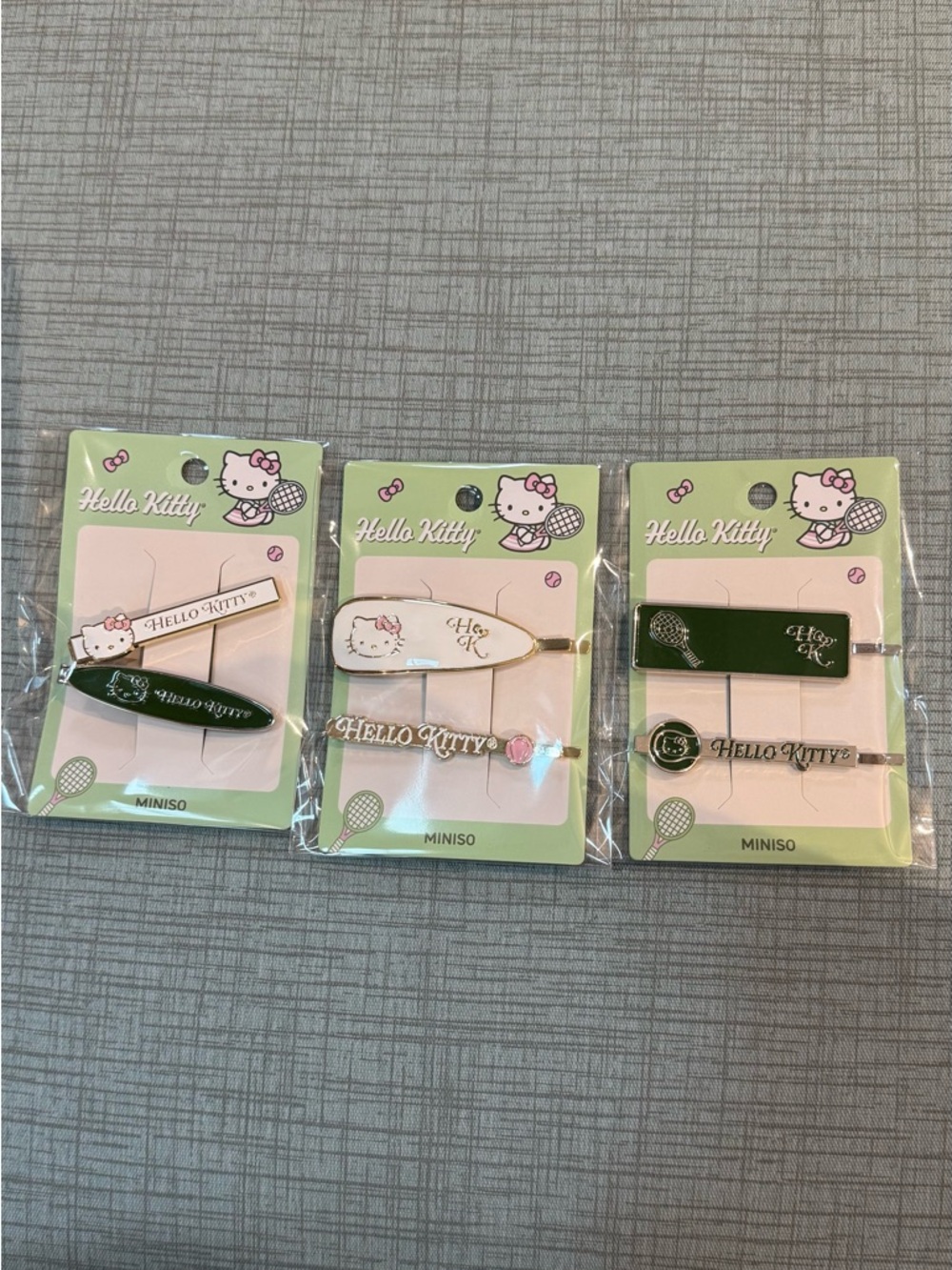 NIB Limited edition Miniso hello Kitty tennis club hair clip bundle set